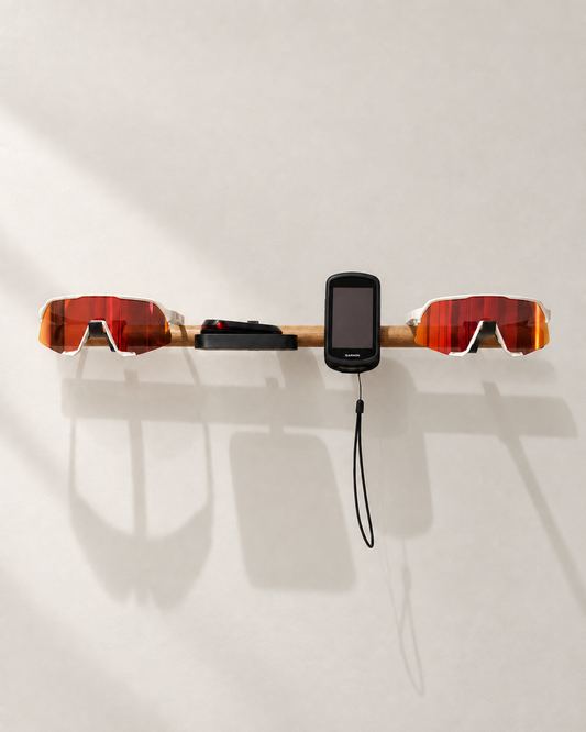 Bar 600 D oak rack displaying a phone holder and cycling glasses